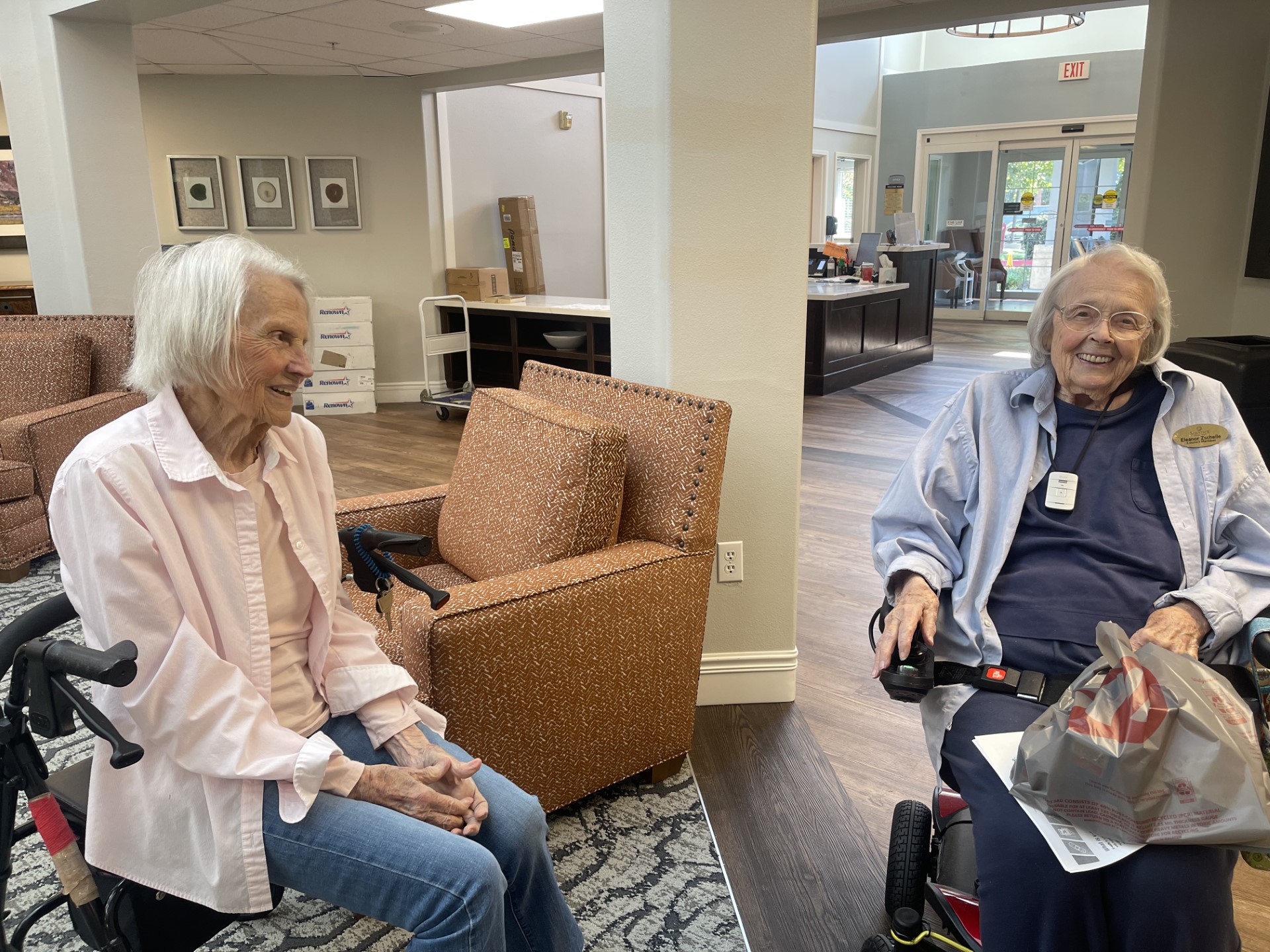 Residents chatting in the lobby Clovis